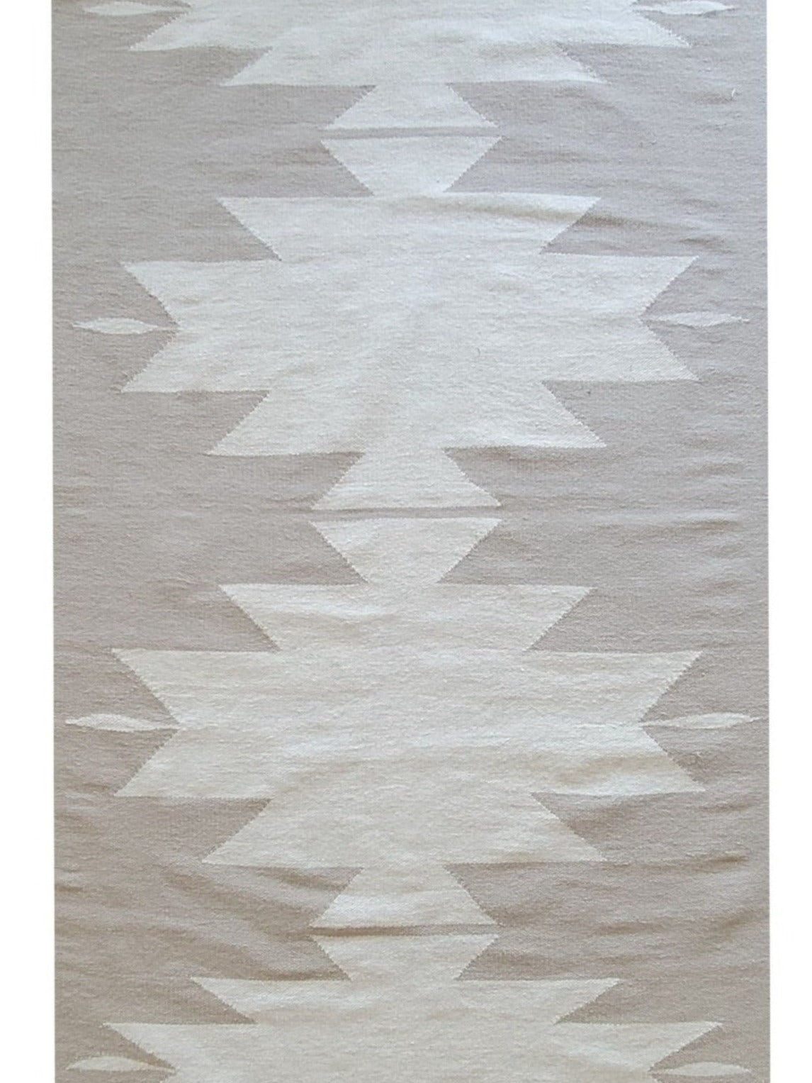 beige handmade rug