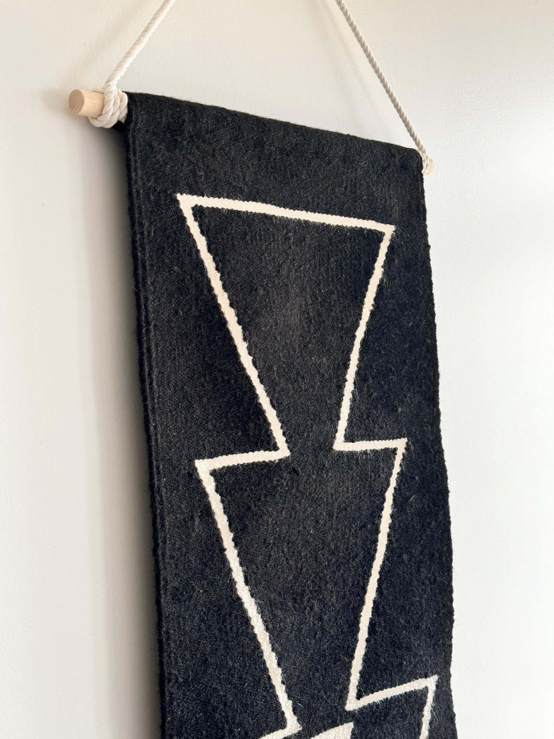 Black handwoven wall hanging tapestry