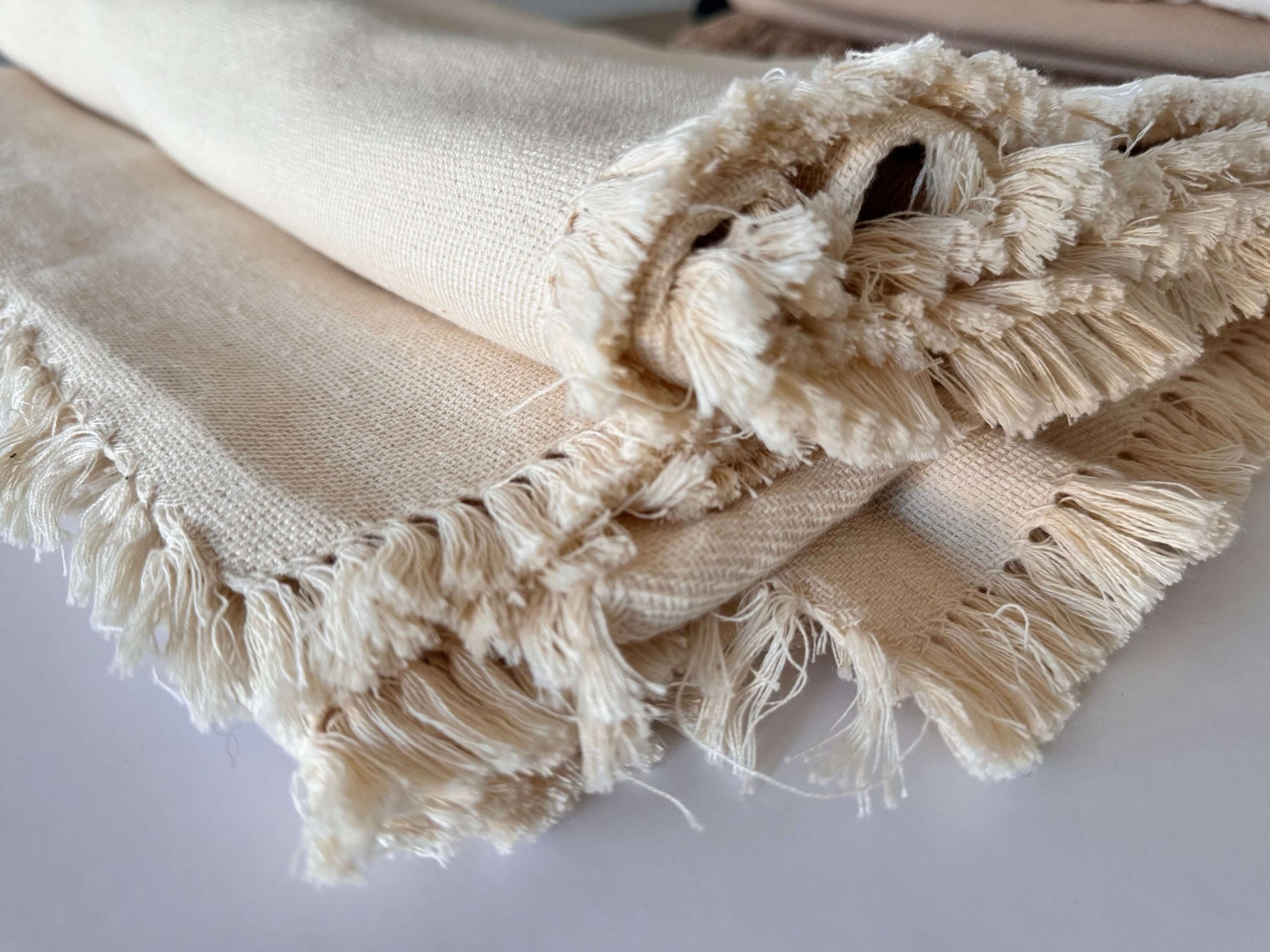 Close-up of the fringed edge of a Nazly bed cover