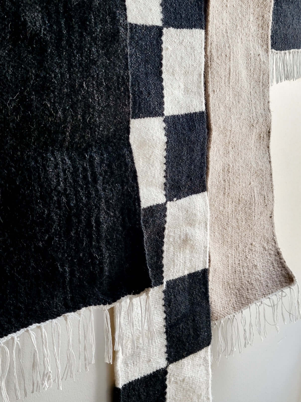 black beige rug wall hanging