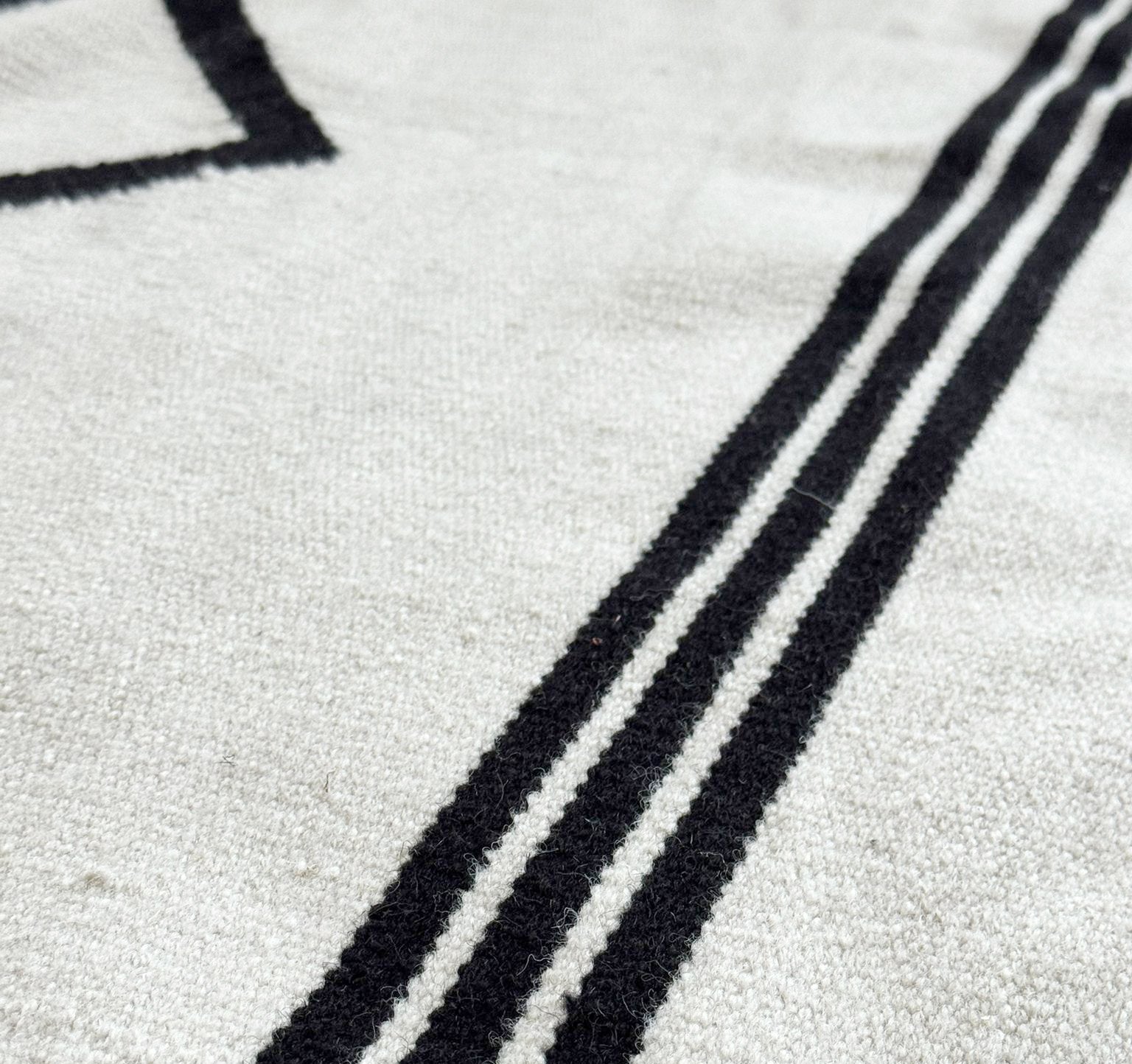 Roxie Handwoven Black and Cream Area Rug