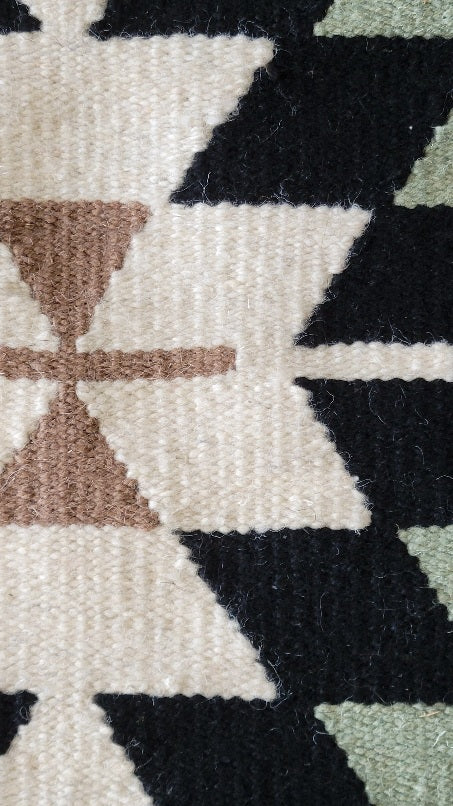 green wall hanging rug