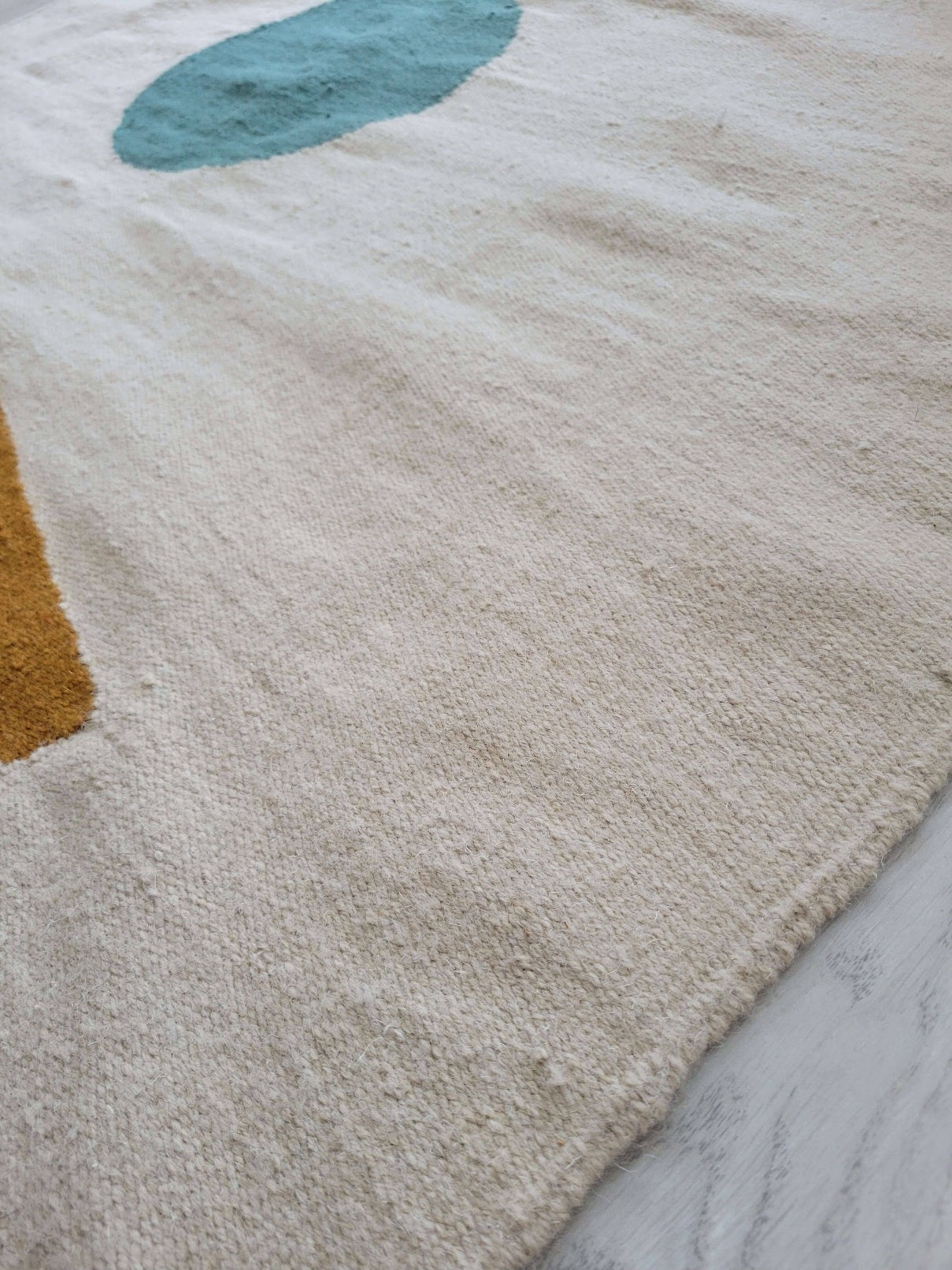 beige handmade rug