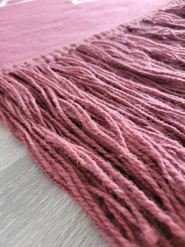 mulberry rug with tassles