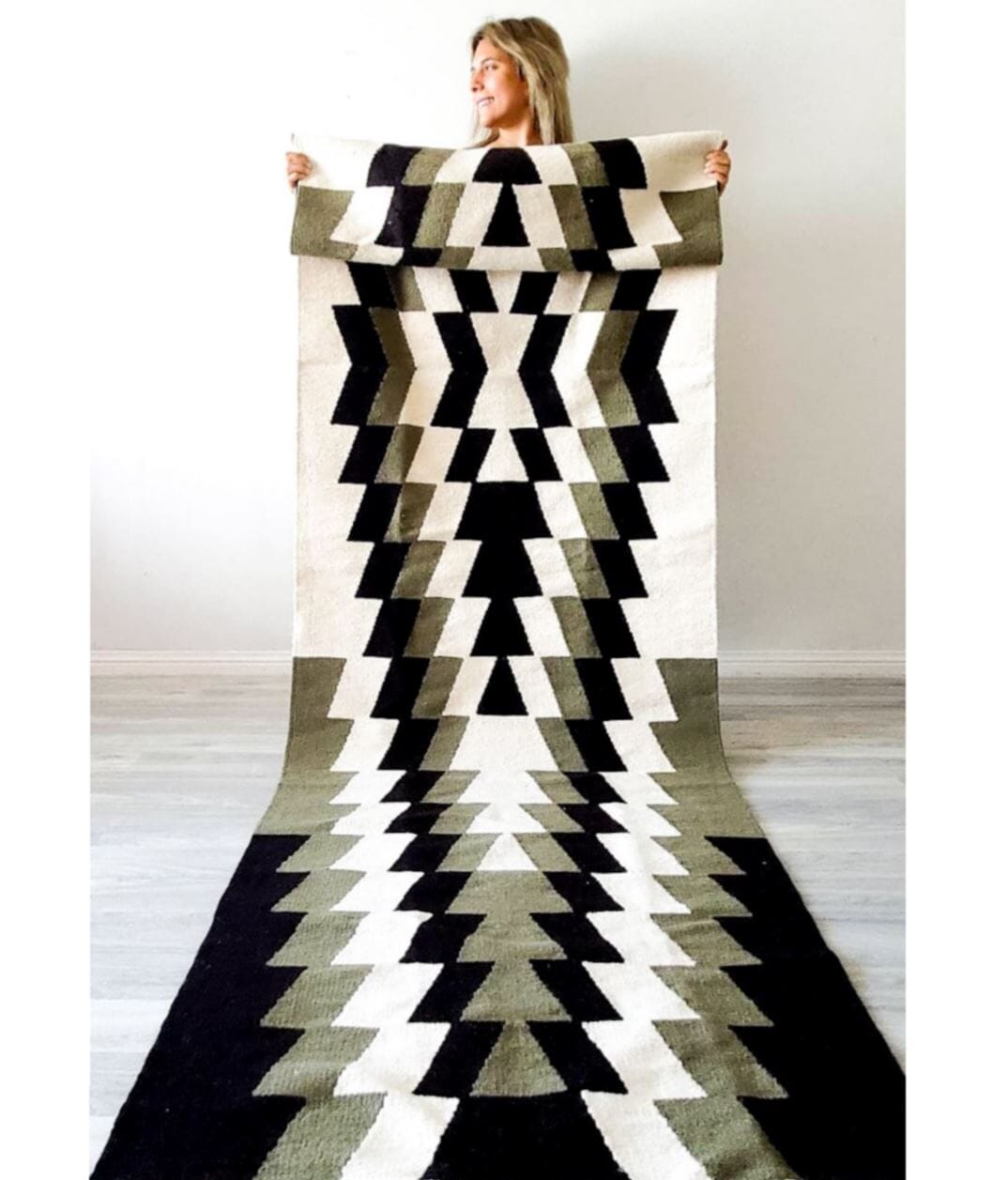 Handwoven rug with green accents