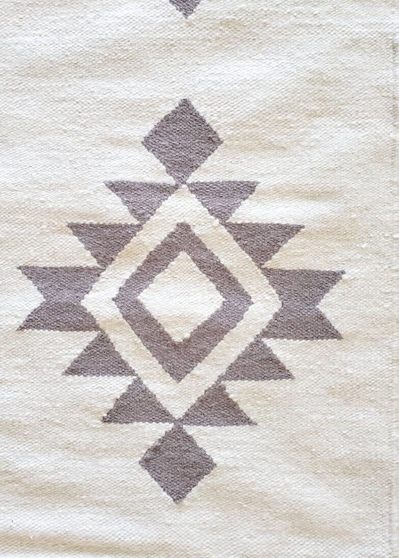 white rug wall hanging