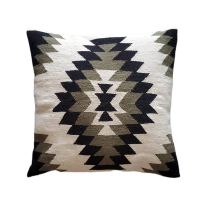 Decorative pillow with geometric pattern on a white background