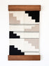 Woven wall art with geometric pattern and wooden frame