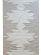 beige handmade rug