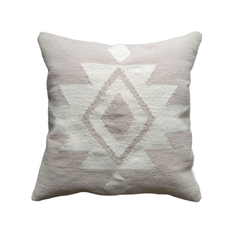 Decorative pillow with geometric pattern on a white background