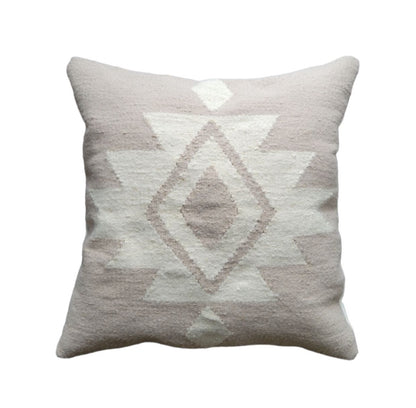 Decorative pillow with geometric pattern on a white background