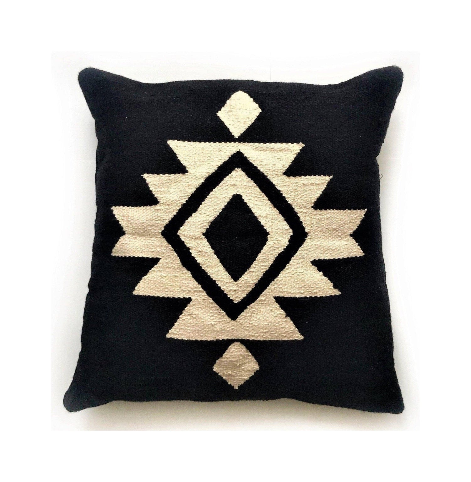 Black pillow with a geometric pattern on a white background