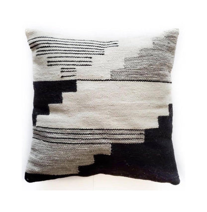 Decorative pillow with geometric pattern on a white background