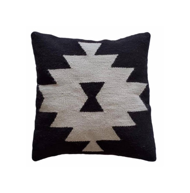 Decorative pillow with geometric pattern on a white background