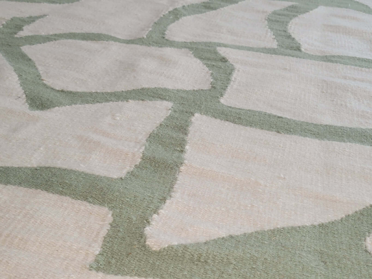 modern rug green and cream
