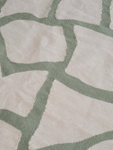 green and cream modern rug