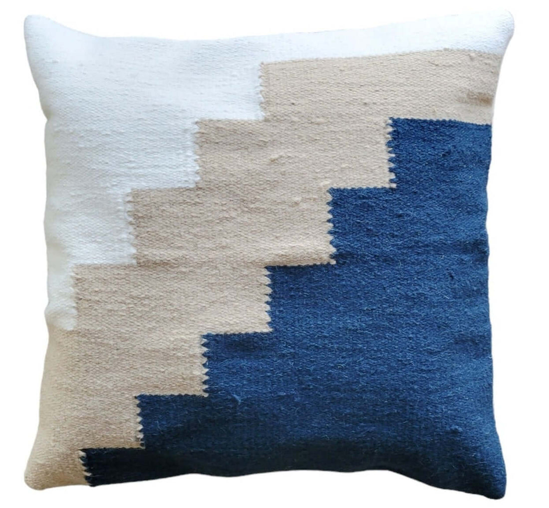 blue and beige throw pillow