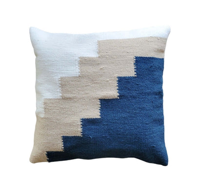 Decorative pillow with geometric pattern on a white background