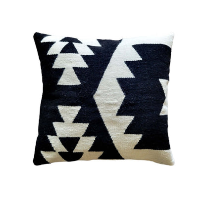 Decorative pillow with black and Cream Ivory geometric pattern on a white background