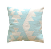 Decorative pillow with geometric pattern on a white background