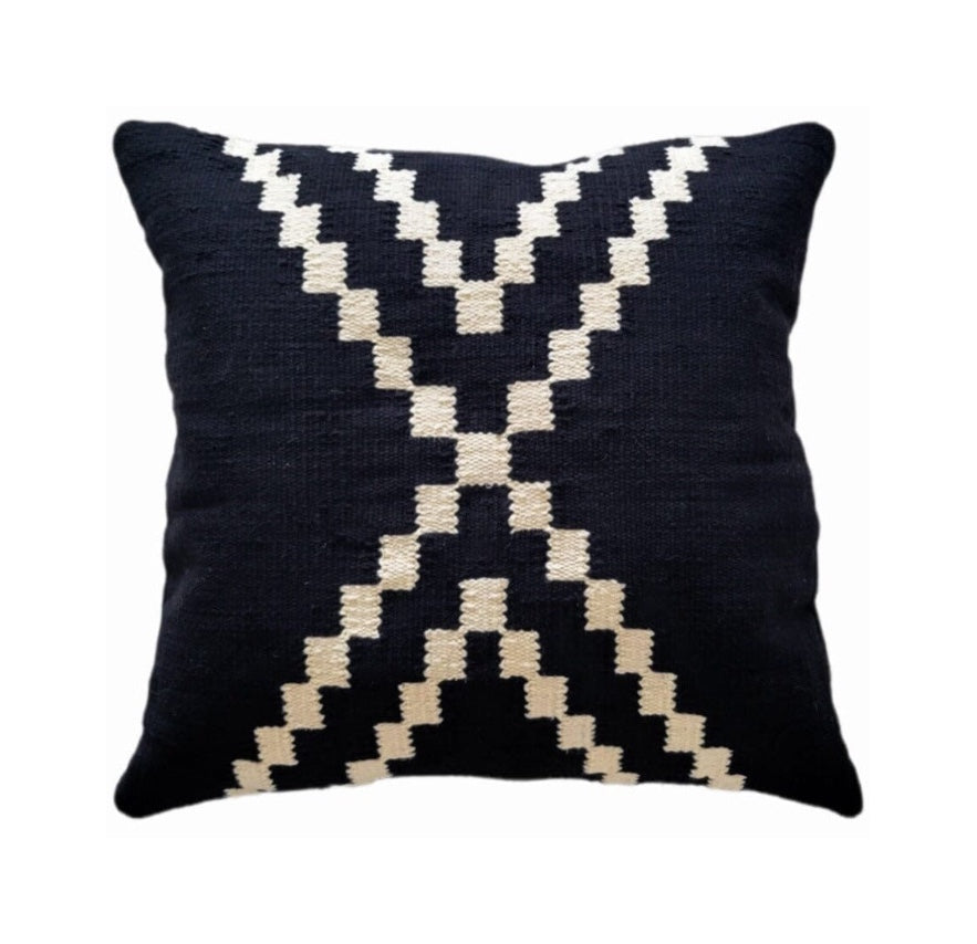Decorative cotton black pillow with white geometric pattern 
