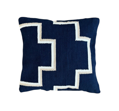 Ivory Beige pillow with white zigzag pattern on a Navy Blue background