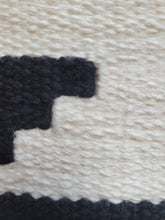 black and cream decorative pillow