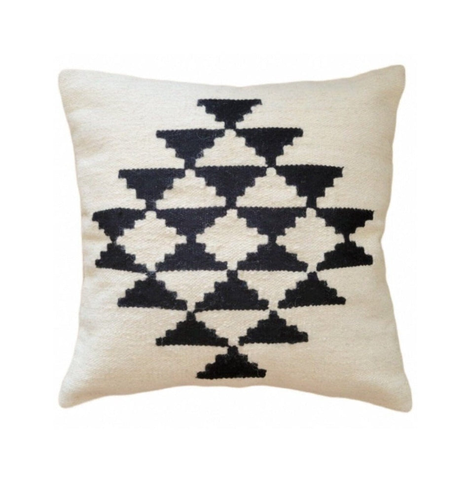 Decorative pillow with black geometric pattern on a white background