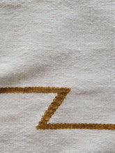 cream and mustard kilim