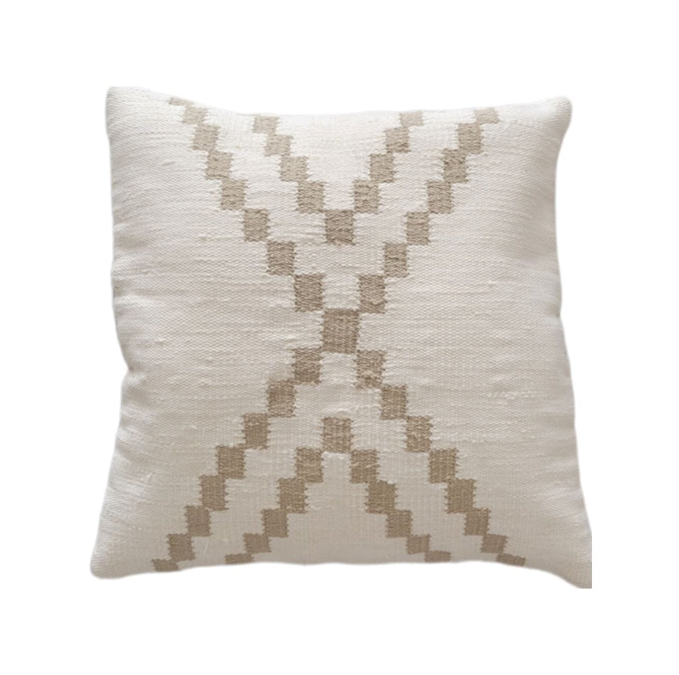 Decorative pillow with geometric pattern on a white background