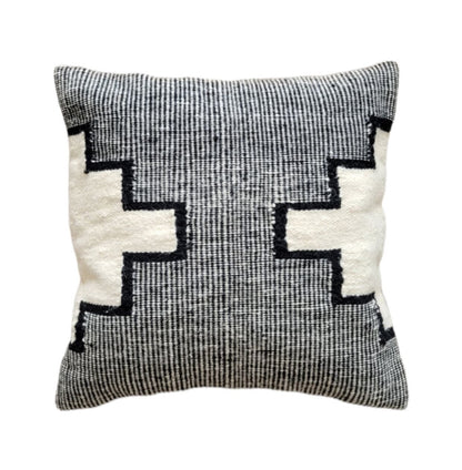 Decorative pillow with geometric pattern on a white background