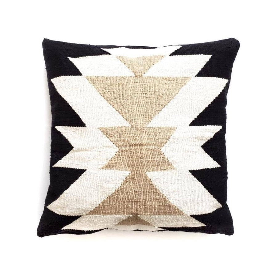 Decorative pillow with geometric pattern on a white background