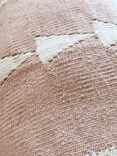 Close-up of a textured fabric with a geometric pattern