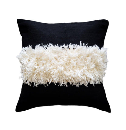 Black pillow with white fluffy texture