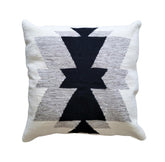 Decorative pillow with geometric pattern on a white background