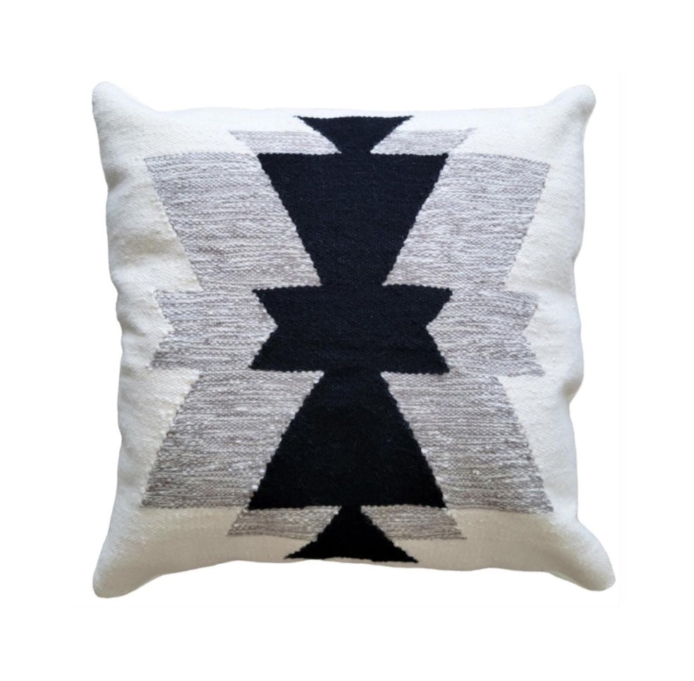 Decorative pillow with geometric pattern on a white background