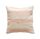 Striped pillow with pink and beige colors on a cream ivory background