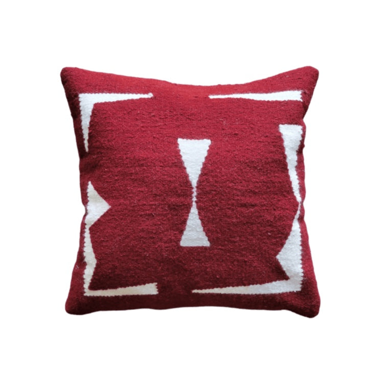 Red and white patterned pillow