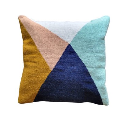 Colorful geometric pillow with triangles on a multicolor background