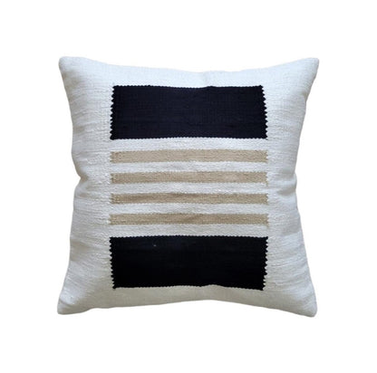 Decorative pillow with black and beige stripes on a white background