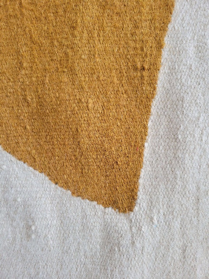 beige and mustard rug