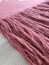 mulberry rug with tassles