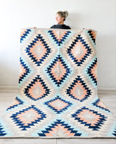 colorful rug navy blue and cream