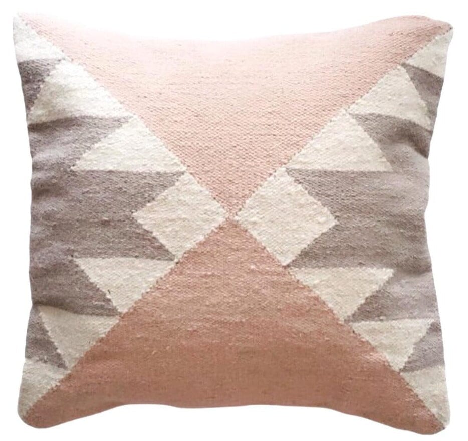 pink and cream decorative pillow