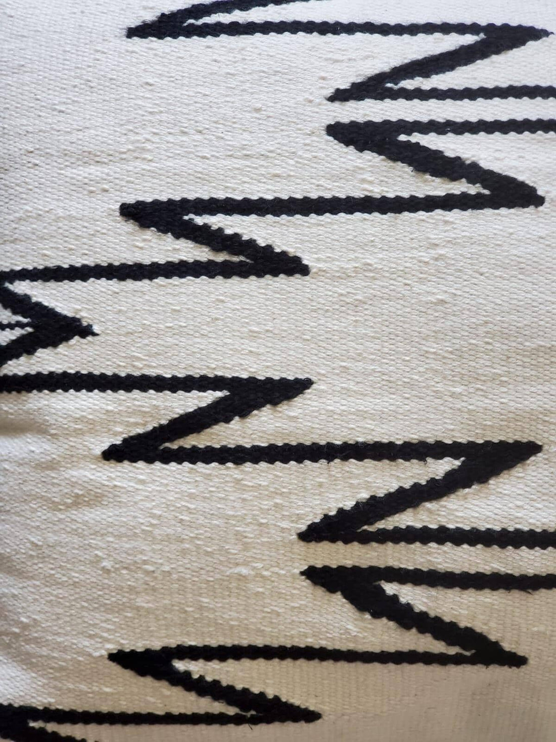 Handwoven decorative black and white cushions